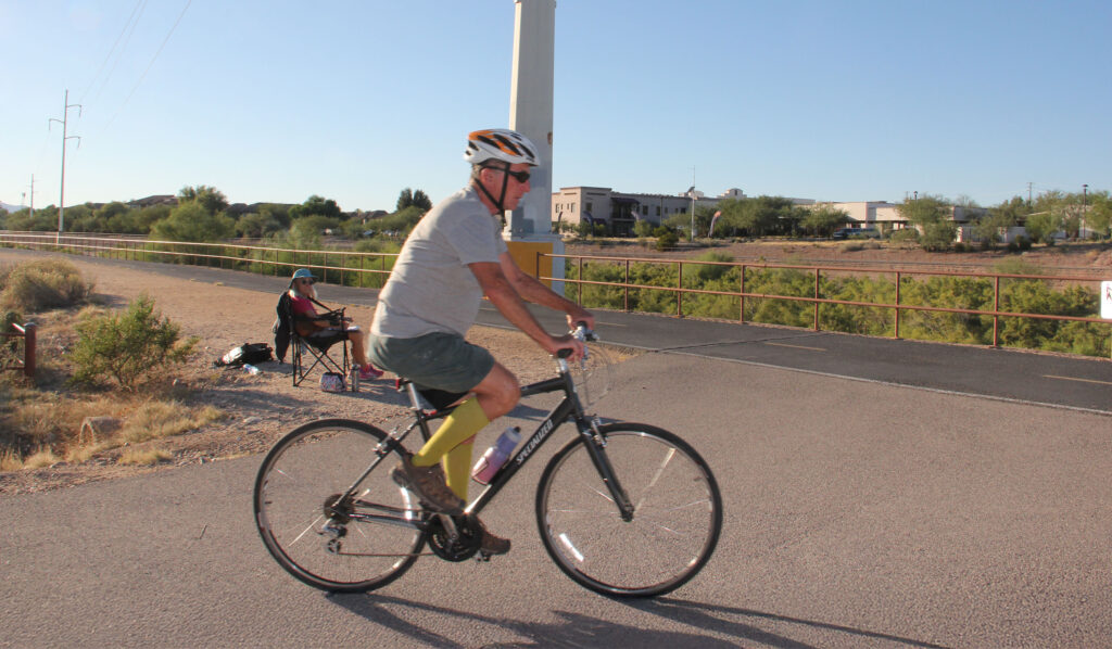 Older cyclist riding his bike on the Loop.