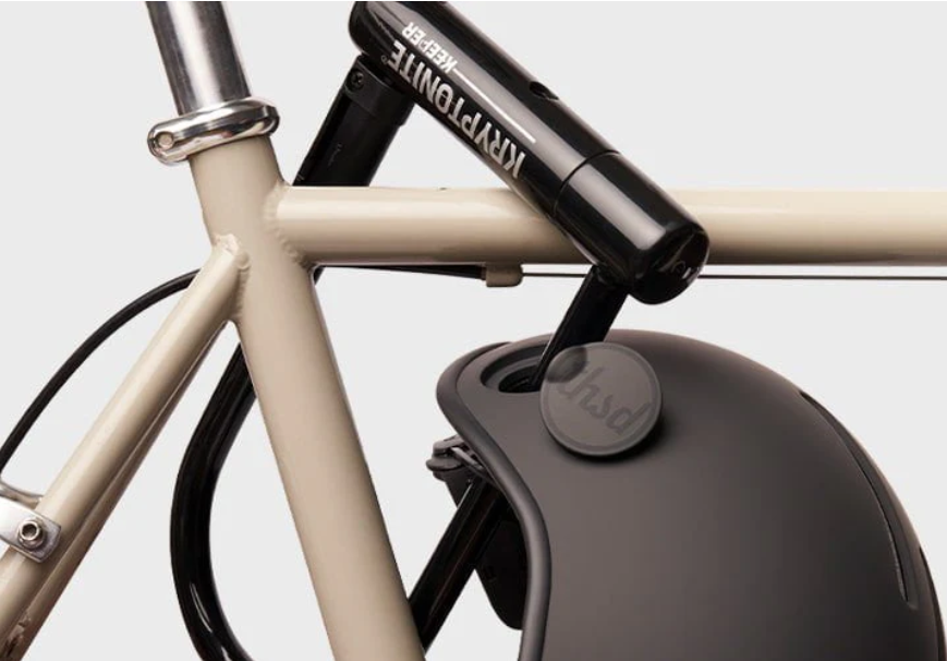 Thousand brand bike helmet locked to a bike.