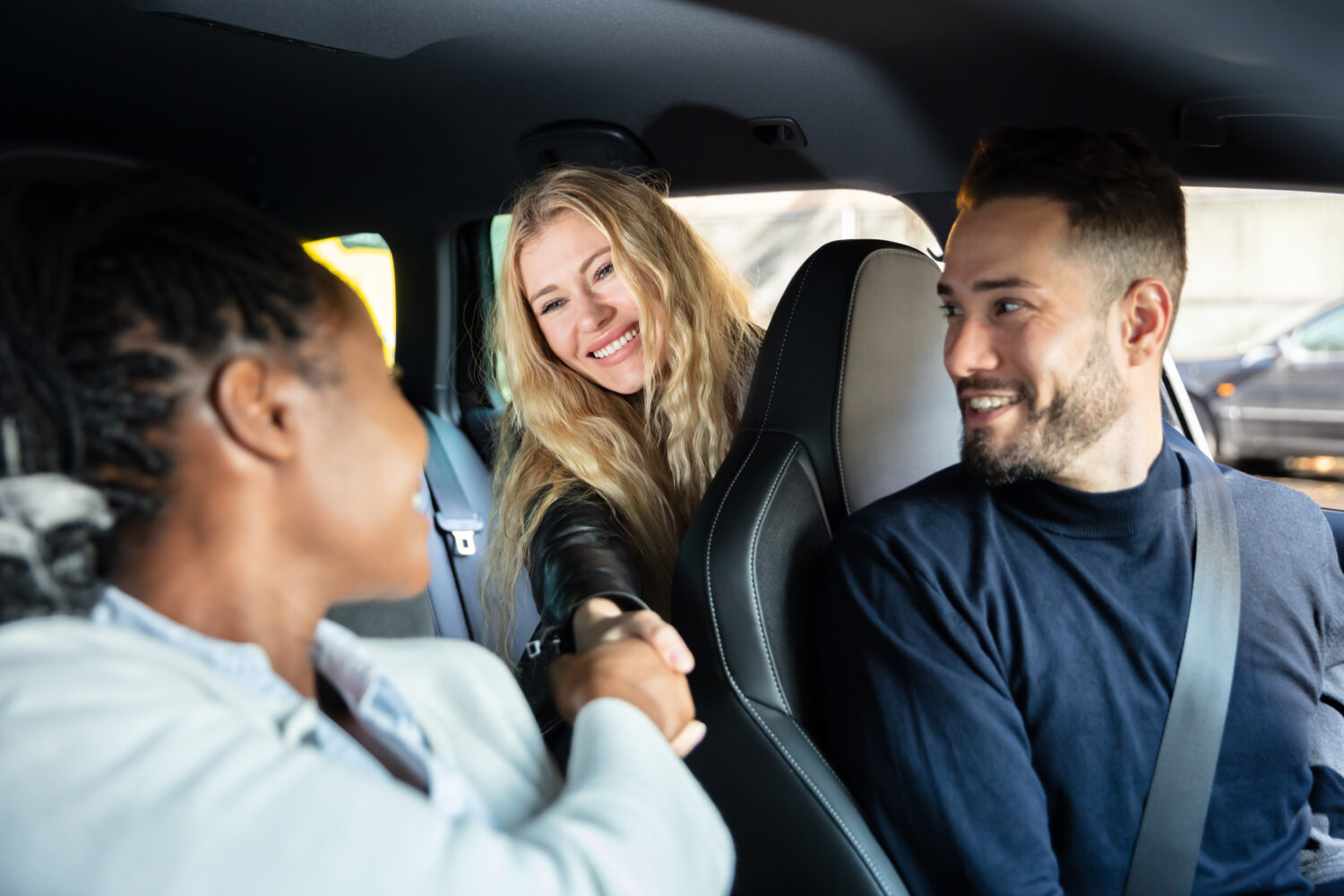 Carpool commuters greet each other.